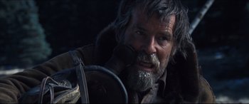Movie still from “Seraphim Falls” (2006), directed by David Von Ancken – A person with a beard; Close Up shot, Over the shoulder angle