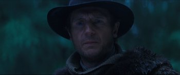 Movie still from “Seraphim Falls” (2006), directed by David Von Ancken – A person wearing a hat; Close Up shot, Low angle