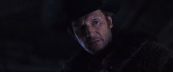 Movie still from “Seraphim Falls” (2006), directed by David Von Ancken – A person wearing a hat; Close Up shot, Low angle