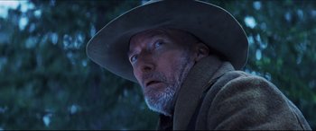 Movie still from “Seraphim Falls” (2006), directed by David Von Ancken – A person wearing a hat; Close Up shot, Low angle