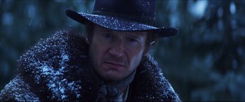 Movie still from “Seraphim Falls” (2006), directed by David Von Ancken – A person wearing a hat; Close Up shot, Low angle
