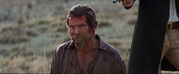 Movie still from “Seraphim Falls” (2006), directed by David Von Ancken – A person with a beard; Close Up shot, Over the shoulder angle