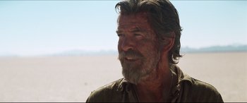 Movie still from “Seraphim Falls” (2006), directed by David Von Ancken – A person with a beard; Close Up shot, Over the shoulder angle