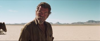 Movie still from “Seraphim Falls” (2006), directed by David Von Ancken – A person with a beard; Close Up shot, Over the shoulder angle