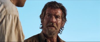 Movie still from “Seraphim Falls” (2006), directed by David Von Ancken – A person with long hair and a beard; Close Up shot, Low angle