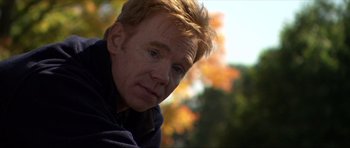 Movie still from “Session 9” (2001), directed by Brad Anderson – A person with blonde hair; Close Up shot, High angle