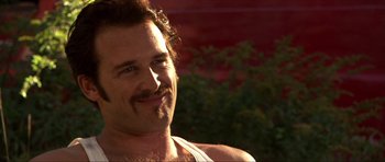 Movie still from “Session 9” (2001), directed by Brad Anderson – A person with a beard and mustache; Close Up shot, Low angle