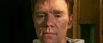 Movie still from “Session 9” (2001), directed by Brad Anderson – A man's face with a lot of wrinkles on his face; Close Up shot, High angle
