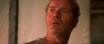 Movie still from “Session 9” (2001), directed by Brad Anderson – A person looking up at the sky; Close Up shot, Low angle