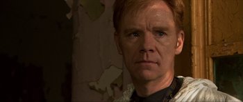 Movie still from “Session 9” (2001), directed by Brad Anderson – A person wearing a shirt; Close Up shot, Over the shoulder angle