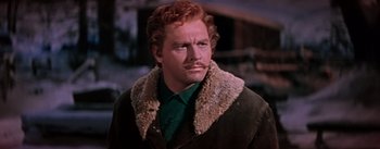 Movie still from “Seven Brides for Seven Brothers” (1954), directed by Stanley Donen – A person wearing a jacket; Close Up shot, Low angle