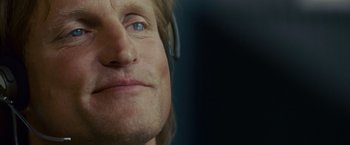 Movie still from “Seven Pounds” (2008), directed by Gabriele Muccino – A man's face wearing headphones; Close Up shot, Low angle