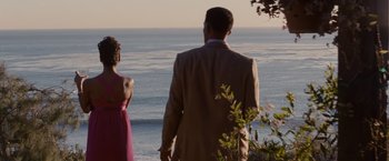 Movie still from “Seven Pounds” (2008), directed by Gabriele Muccino – A man and a woman looking out at the ocean; Wide shot, Over the shoulder angle