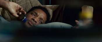 Movie still from “Seven Pounds” (2008), directed by Gabriele Muccino – A person laying in a bed near a pillow; Close Up shot, High angle
