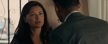 Movie still from “Seven Pounds” (2008), directed by Gabriele Muccino – A man and a woman looking at one another in a mirror; Close Up shot, Over the shoulder angle