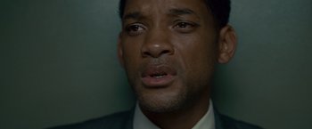 Movie still from “Seven Pounds” (2008), directed by Gabriele Muccino – A person wearing a suit and tie; Close Up shot, Low angle