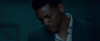 Movie still from “Seven Pounds” (2008), directed by Gabriele Muccino – A person wearing a suit and tie; Close Up shot, Low angle