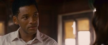 Movie still from “Seven Pounds” (2008), directed by Gabriele Muccino – A person wearing a white shirt; Close Up shot, Over the shoulder angle