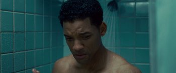 Movie still from “Seven Pounds” (2008), directed by Gabriele Muccino – A person taking a shower in a room; Close Up shot, High angle