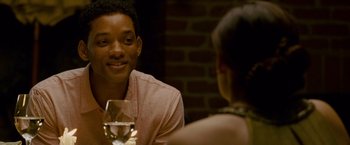 Movie still from “Seven Pounds” (2008), directed by Gabriele Muccino – A man and a woman sitting at a dinner table; Close Up shot, Over the shoulder angle