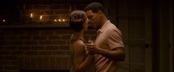Movie still from “Seven Pounds” (2008), directed by Gabriele Muccino – A man and a woman dancing in front of a brick wall; Close Up shot, Low angle