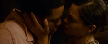 Movie still from “Seven Pounds” (2008), directed by Gabriele Muccino – A man and a woman touching their faces together; Close Up shot, High angle