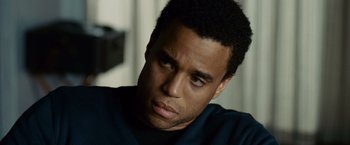 Movie still from “Seven Pounds” (2008), directed by Gabriele Muccino – A person looking at the camera; Close Up shot, Over the shoulder angle