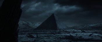 Movie still from “1899” (2022), created by Jantje Friese – A dark picture of a pyramid in the middle of the night; Extreme Wide shot, High angle