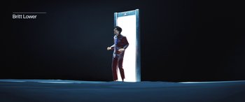 Movie still from “Severance” (2022), created by Dan Erickson – A man standing in front of an open door; Wide shot, Low angle