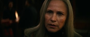 Movie still from “Severance” (2022), created by Dan Erickson – A person with long blonde hair; Close Up shot, Over the shoulder angle