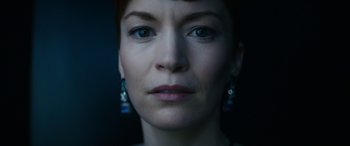 Movie still from “Severance” (2022), created by Dan Erickson – A woman's face in the dark; Close Up shot, Low angle