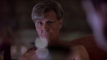 Movie still from “Sexy Beast” (2000), directed by Jonathan Glazer – A person in a room; Close Up shot, Low angle