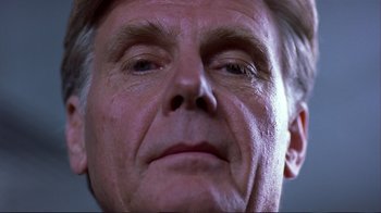 Movie still from “Sexy Beast” (2000), directed by Jonathan Glazer – An older man's face is lit up by the sun; Close Up shot, Low angle