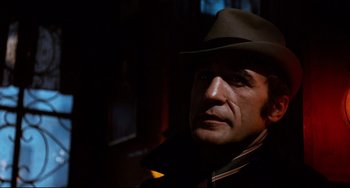 Movie still from “Shaft” (1971), directed by Gordon Parks – A person wearing a hat; Close Up shot, Low angle