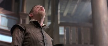 Movie still from “Shakespeare in Love” (1998), directed by John Madden – A man with his eyes closed and his head tilted to the side; Close Up shot, Low angle