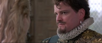 Movie still from “Shakespeare in Love” (1998), directed by John Madden – A person with a beard; Close Up shot, Over the shoulder angle