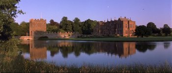 Movie still from “Shakespeare in Love” (1998), directed by John Madden – A pond in the middle of a park with trees in the background; Extreme Wide shot, High angle