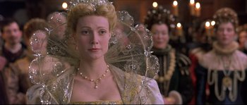 Movie still from “Shakespeare in Love” (1998), directed by John Madden – A woman in a white dress with a veil on her head; Close Up shot, Low angle