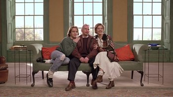 Movie still from “Shallow Grave” (1994), directed by Danny Boyle – A group of people sitting on top of a couch; Wide shot, Low angle