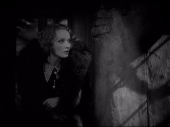 Movie still from “Shanghai Express” (1932), directed by Josef von Sternberg – An old photo of a woman in a fur coat; Close Up shot, Low angle