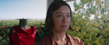 Movie still from “1922” (2017), directed by Zak Hilditch – A person with short brown hair; Close Up shot, Over the shoulder angle