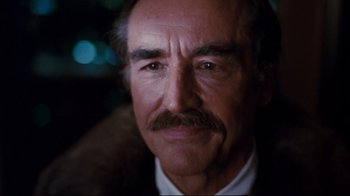 Movie still from “Sharky's Machine” (1981), directed by Burt Reynolds – An older man with a mustache; Close Up shot, Low angle