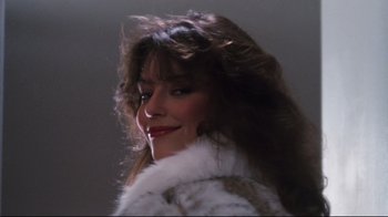 Movie still from “Sharky's Machine” (1981), directed by Burt Reynolds – A person wearing a fur coat; Close Up shot, Low angle