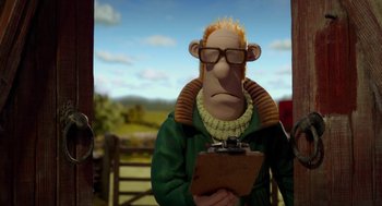Movie still from “Shaun the Sheep Movie” (2015), directed by Mark Burton – A man with a clipboard in his hands; Medium shot, Over the shoulder angle