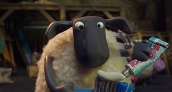 Movie still from “Shaun the Sheep Movie” (2015), directed by Mark Burton – A sheep with a toothbrush in it's mouth; Close Up shot, High angle