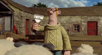 Movie still from “Shaun the Sheep Movie” (2015), directed by Mark Burton – A man holding a fork in his hand; Medium shot, Low angle