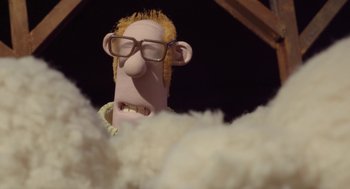 Movie still from “Shaun the Sheep Movie” (2015), directed by Mark Burton – The head of a cartoon character; Close Up shot, Low angle