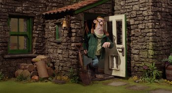 Movie still from “Shaun the Sheep Movie” (2015), directed by Mark Burton – A cartoon of a man standing in front of a stone house; Wide shot, Low angle