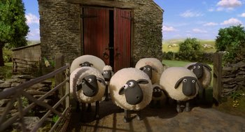 Movie still from “Shaun the Sheep Movie” (2015), directed by Mark Burton – A group of sheep standing next to each other; Wide shot, High angle