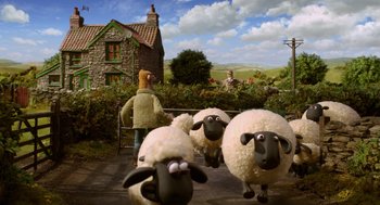 Movie still from “Shaun the Sheep Movie” (2015), directed by Mark Burton – A herd of sheep standing next to a man; Wide shot, Low angle
